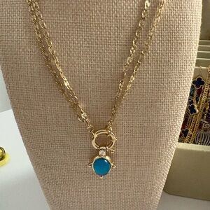 Gold Necklace with Blue Pendant